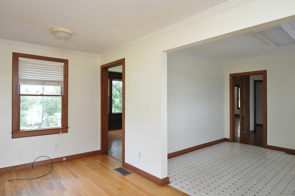dining here is the opposite view of the dining room with the kitchen to the right as well as the entry to the living room.